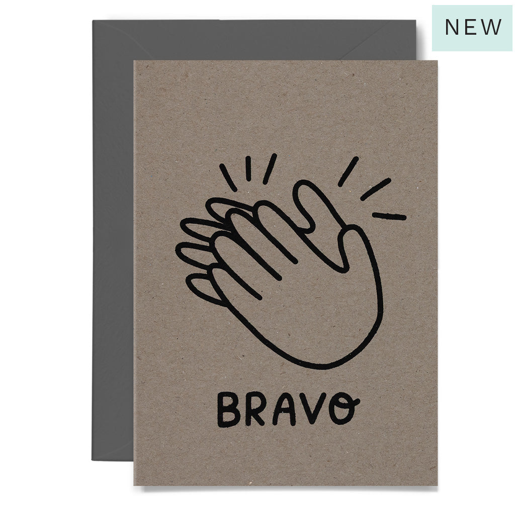 Kraft paper card with clapping hands illustration and 'Bravo' text