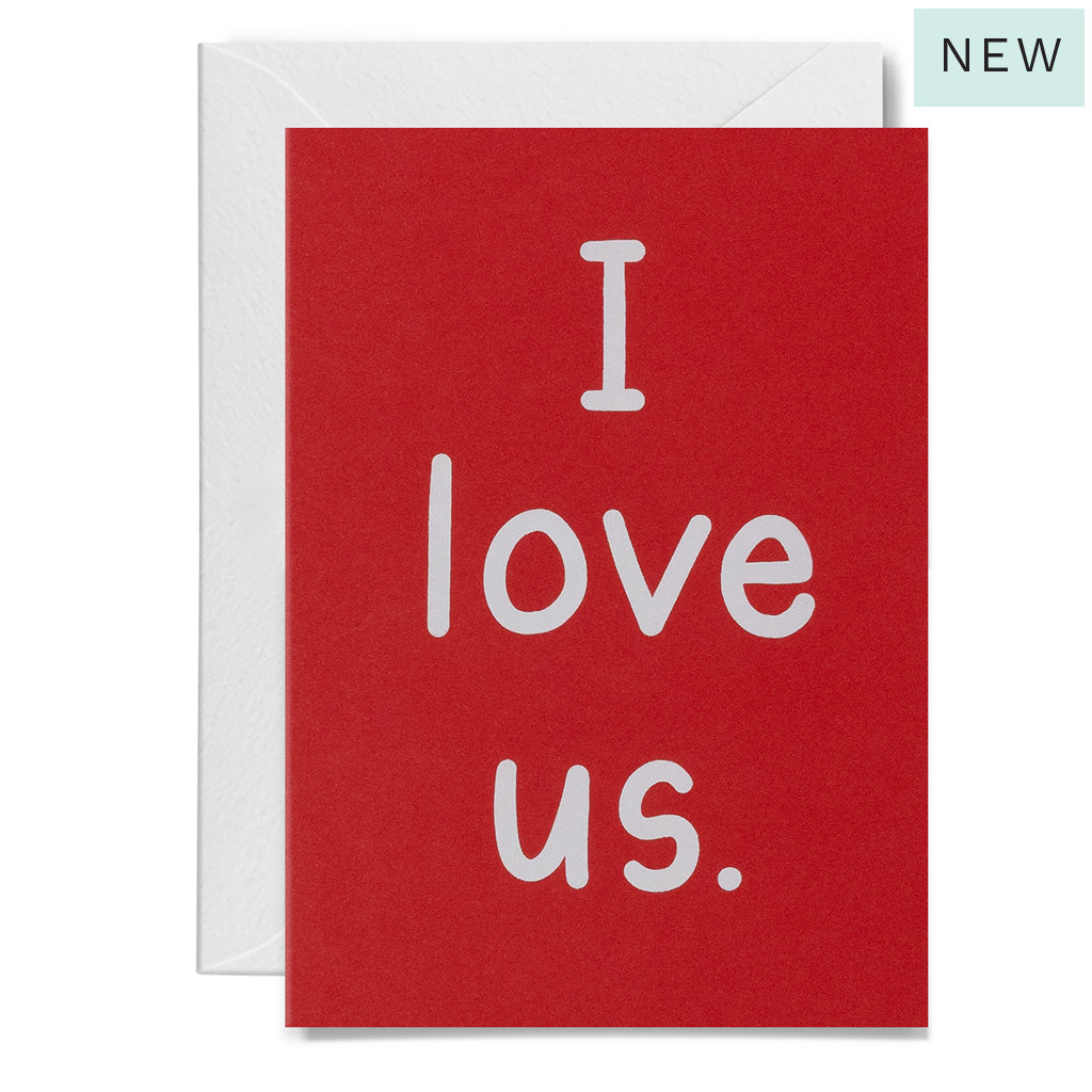 Red card with 'I love us' text 