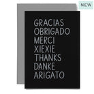 Black card with white text listing various languages of thanks