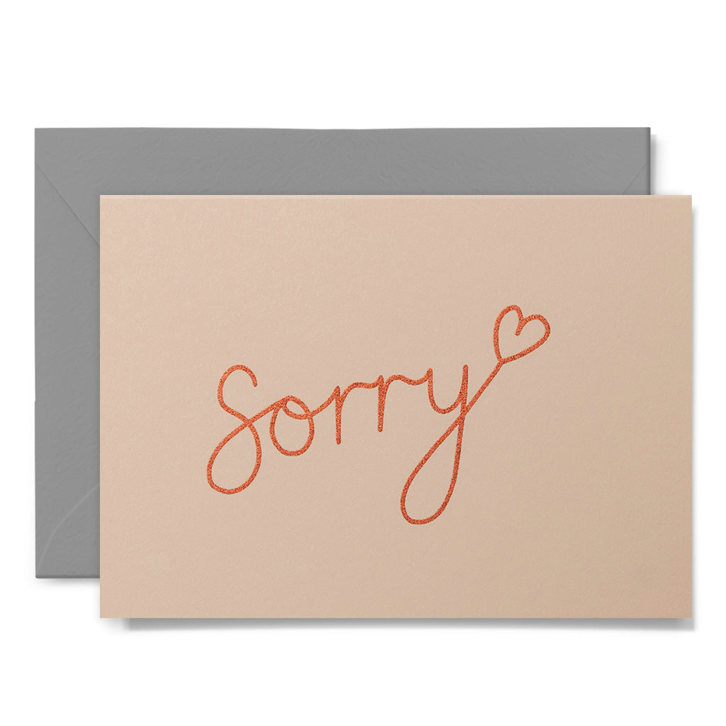 Apology card with sorry text and heart