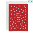 Red card with white hearts